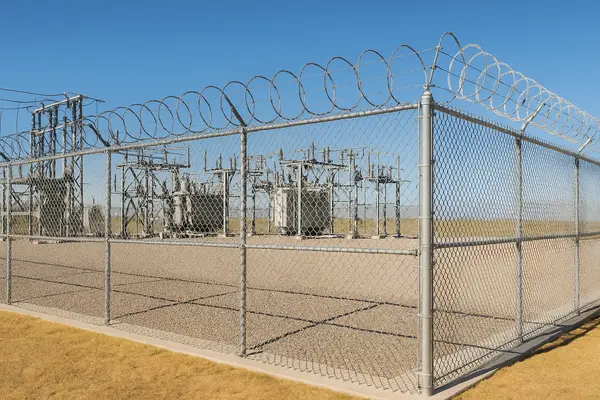 an electric substation surrounded by a chain fence from PLANO FENCE REPAIRS in Plano, TX - AC Compressor Failure Repair
